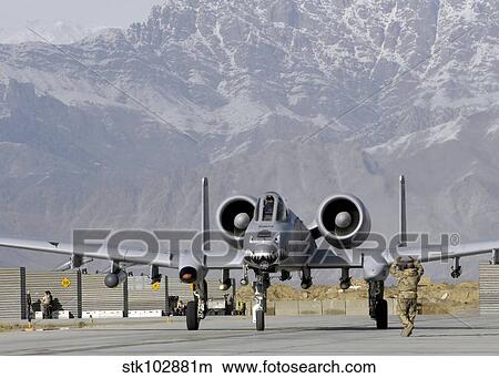 An A10 Thunderbolt II taxis down Bagram Air Field. View Large Photo Image Picture - An A10 Thunderbolt II taxis down Bagram Air Field.. Fotosearch