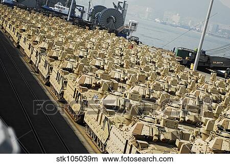 Picture - An abundance of Bradley Fighting Vehicles at Pier 8, Busan, South Korea.. Fotosearch