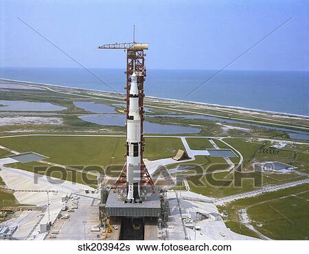 An aerial view of the Apollo 15 spacecraft on its launch pad. View Large Photo Image Stock Photograph - An aerial view of the Apollo 15 spacecraft on its launch pad.. Fotosearch