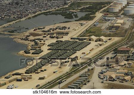 An aerial view of the White Beach logistical compound in Port-au-Prince, Haiti. View Large Photo Image Picture - An aerial view of the White Beach logistical compound in Port-au-Prince, Haiti.. Fotosearch