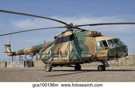 An Afghan Air Force MI-17 helicopter at Shindand Air Base, Afghanistan. View Large Photo Image Picture - An Afghan Air Force MI-17 helicopter at Shindand Air Base, Afghanistan.. Fotosearch