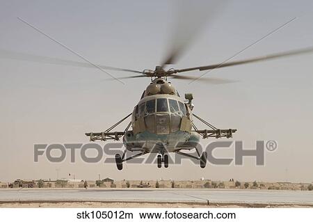 An Afghan Air Force Russian Mil MI-17 helicopter takes off from Camp Shorabak, Afghanistan. View Large Photo Image Picture - An Afghan Air Force Russian Mil MI-17 helicopter takes off from Camp Shorabak, Afghanistan.. Fotosearch
