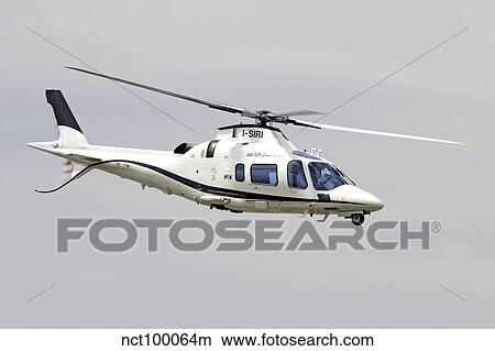 An Agusta Westland A109 Power Elite helicopter. View Large Photo Image Picture - An Agusta Westland A109 Power Elite helicopter.. Fotosearch