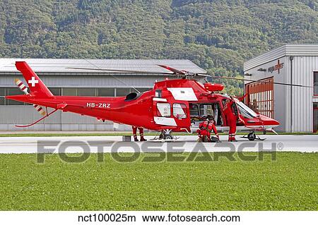An AgustaWestland AW109 helicopter of the Swiss Air Rescue. View Large Photo Image Picture - An AgustaWestland AW109 helicopter of the Swiss Air Rescue.. Fotosearch