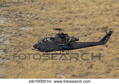 An AH-1F Tzefa of the Israeli Air Force flying over Israel. View Large Photo Image Picture - An AH-1F Tzefa of the Israeli Air Force flying over Israel.. Fotosearch