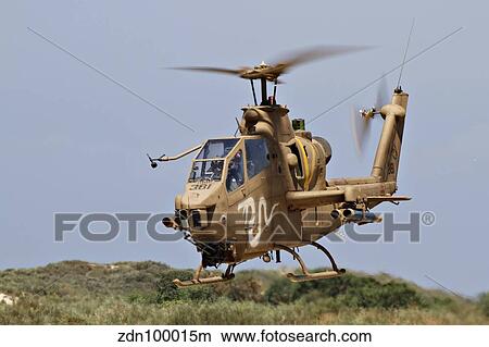 An AH-1S Tzefa attack helicopter of the Israeli Air Force. View Large Photo Image Picture - An AH-1S Tzefa attack helicopter of the Israeli Air Force.. Fotosearch