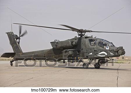 An AH-64 Apache helicopter. View Large Photo Image Picture - An AH-64 Apache helicopter.. Fotosearch