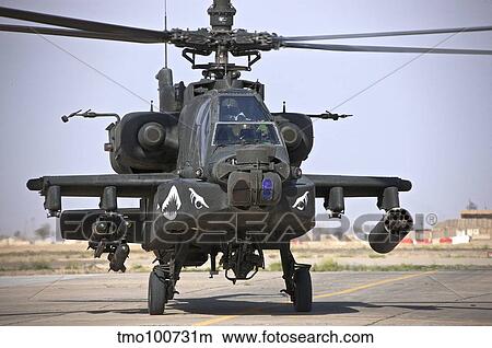An AH-64 Apache helicopter. View Large Photo Image Picture - An AH-64 Apache helicopter.. Fotosearch