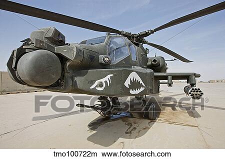 An AH-64D Apache helicopter at COB Speicher, Tikrit, Iraq. View Large Photo Image Picture - An AH-64D Apache helicopter at COB Speicher, Tikrit, Iraq.. Fotosearch