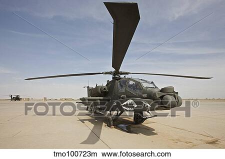Picture - An AH-64D Apache helicopter at COB Speicher, Tikrit, Iraq.. Fotosearch