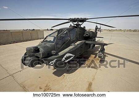An AH-64D Apache helicopter at COB Speicher, Tikrit, Iraq. View Large Photo Image Picture - An AH-64D Apache helicopter at COB Speicher, Tikrit, Iraq.. Fotosearch