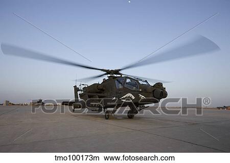 An AH-64D Apache Longbow Block III gets ready for takeoff. View Large Photo Image Picture - An AH-64D Apache Longbow Block III gets ready for takeoff.. Fotosearch
