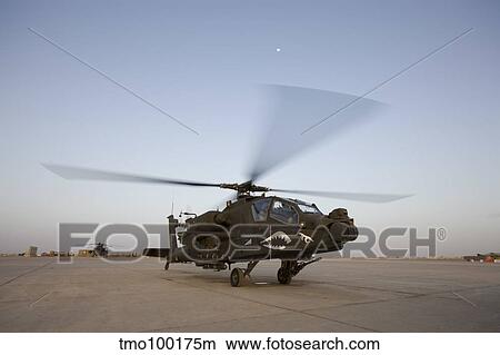 An AH-64D Apache Longbow Block III gets ready for takeoff. View Large Photo Image Picture - An AH-64D Apache Longbow Block III gets ready for takeoff.. Fotosearch
