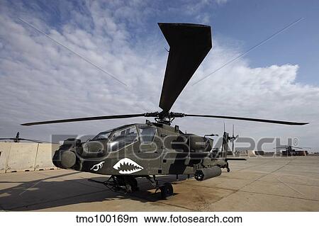 An AH-64D Apache Longbow Block III on the flight line at Camp Speicher. View Large Photo Image Picture - An AH-64D Apache Longbow Block III on the flight line at Camp Speicher.. Fotosearch