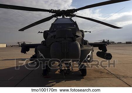 An AH-64D Apache Longbow Block III on the flight line at Camp Speicher. View Large Photo Image Picture - An AH-64D Apache Longbow Block III on the flight line at Camp Speicher.. Fotosearch