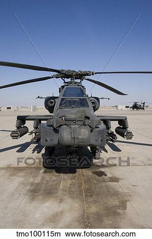 An AH-64D Apache Longbow Block III attack helicopter sits on the flight line. View Large Photo Image Picture - An AH-64D Apache Longbow Block III attack helicopter sits on the flight line.. Fotosearch