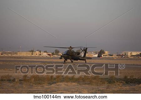An AH-64D Apache Longbow Block III attack helicopter waits for clearance. View Large Photo Image Picture - An AH-64D Apache Longbow Block III attack helicopter waits for clearance.. Fotosearch