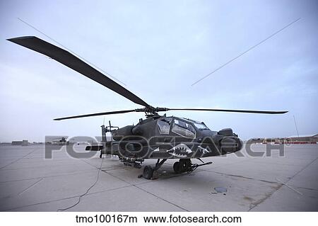 Picture - An AH-64D Apache Longbow Block III prepares for takeoff.. Fotosearch