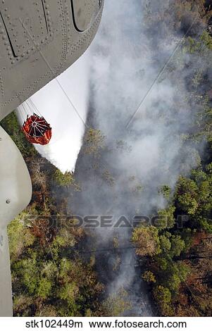 An Air National Guard unit provides air support with a CH-47 Chinook. View Large Photo Image Picture - An Air National Guard unit provides air support with a CH-47 Chinook.. Fotosearch
