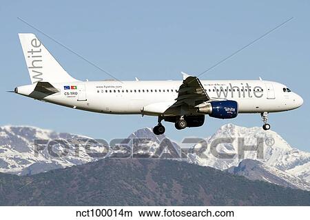 An Airbus A320 of White Airways flying over Italy. View Large Photo Image Picture - An Airbus A320 of White Airways flying over Italy.. Fotosearch