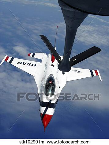 An Altus KC-135 Stratotanker refuels a United States Air Force Thunderbird. View Large Photo Image Picture - An Altus KC-135 Stratotanker refuels a United States Air Force Thunderbird.. Fotosearch