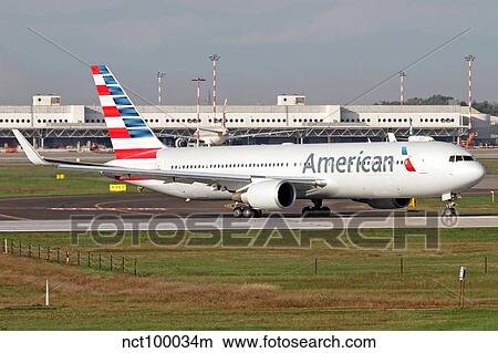 An American Airlines Boeing 767 at Milano Malpensa Airport, Italy. View Large Photo Image Picture - An American Airlines Boeing 767 at Milano Malpensa Airport, Italy.. Fotosearch