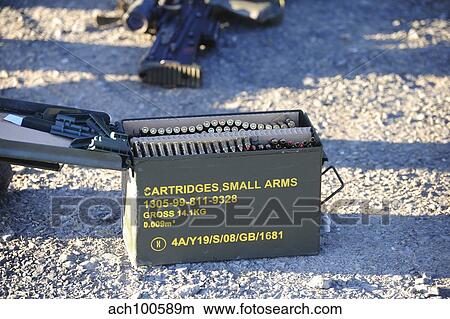 An ammuntion box with 5. 56mm belted rounds inside. View Large Photo Image Picture - An ammuntion box with 5. 56mm belted rounds inside.. Fotosearch