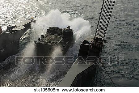 An amphibious assault vehicle debarks from a Military Sealift Command ship. View Large Photo Image Picture - An amphibious assault vehicle debarks from a Military Sealift Command ship.. Fotosearch