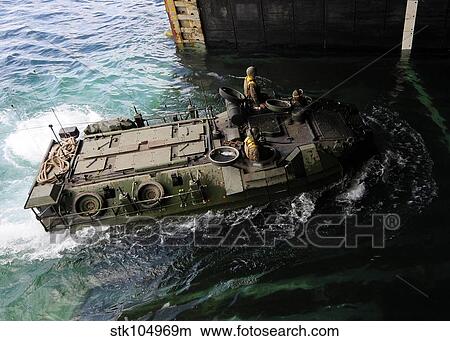An amphibious assault vehicle enters the well deck of USS Germantown. View Large Photo Image Picture - An amphibious assault vehicle enters the well deck of USS Germantown.. Fotosearch