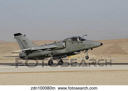 An AMX fighter-bomber of the Italian Air Force taking off. View Large Photo Image Picture - An AMX fighter-bomber of the Italian Air Force taking off.. Fotosearch