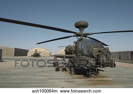 An Apache Helicopter at Camp Bastion, Afghanistan. View Large Photo Image Picture - An Apache Helicopter at Camp Bastion, Afghanistan.. Fotosearch