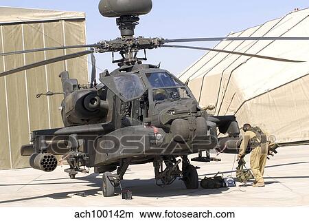 Picture - An Apache helicopter at Camp Bastion, Afghanistan.. Fotosearch