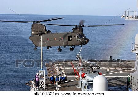 An Army CH-47 Chinook pulls in for a landing aboard USS Blue Ridge. View Large Photo Image Picture - An Army CH-47 Chinook pulls in for a landing aboard USS Blue Ridge.. Fotosearch
