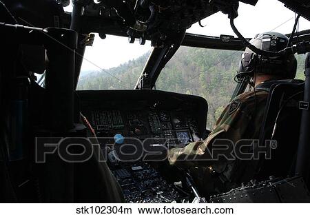 An Army National Guard UH-60 Black Hawk helicopter crew. View Large Photo Image Picture - An Army National Guard UH-60 Black Hawk helicopter crew.. Fotosearch