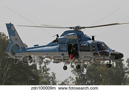 An AS-565 Atalef of the Israeli Air Force in a rescue demonstration. View Large Photo Image Picture - An AS-565 Atalef of the Israeli Air Force in a rescue demonstration.. Fotosearch