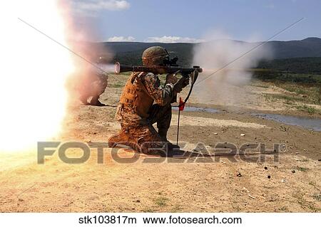 An assaultman fires a Rocket Propelled Grenade. View Large Photo Image Picture - An assaultman fires a Rocket Propelled Grenade.. Fotosearch