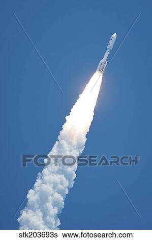 An Atlast V rocket carrying the Juno spacecraft during a midday launch. View Large Photo Image Stock Photograph - An Atlast V rocket carrying the Juno spacecraft during a midday launch.. Fotosearch