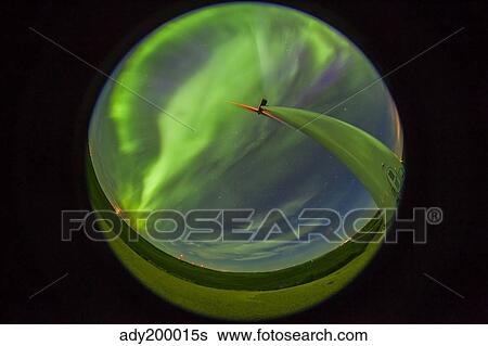 Stock Photograph - An aurora display taken from Wintering Hills Wind Farm, Alberta, Canada.. Fotosearch