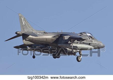 An AV-8B Harrier II flying over Yuma, Arizona. View Large Photo Image Picture - An AV-8B Harrier II flying over Yuma, Arizona.. Fotosearch