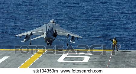 Picture - An AV-8B Harrier II launches from USS Bonhomme Richard.. Fotosearch