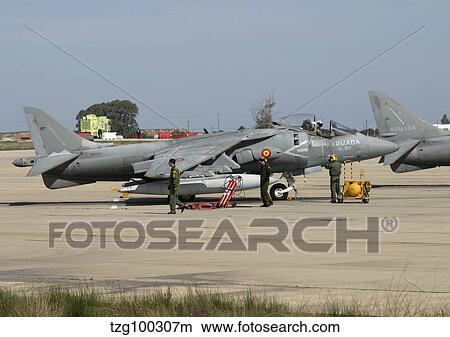 An AV-8B Harrier II of the Spanish Navy preparing for a mission. View Large Photo Image Picture - An AV-8B Harrier II of the Spanish Navy preparing for a mission.. Fotosearch