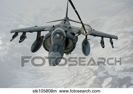 An A/V-8B Harrier receives fuel over Afghanistan from a KC-10 Extender. View Large Photo Image Picture - An A/V-8B Harrier receives fuel over Afghanistan from a KC-10 Extender.. Fotosearch