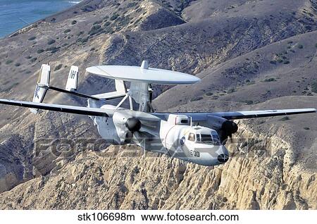 An E-2C Hawkeye aircraft flies over the Pacific Ocean. View Large Photo Image Picture - An E-2C Hawkeye aircraft flies over the Pacific Ocean.. Fotosearch