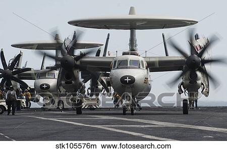 An E-2C Hawkeye aircraft on the flight deck of USS Carl Vinson. View Large Photo Image Picture - An E-2C Hawkeye aircraft on the flight deck of USS Carl Vinson.. Fotosearch