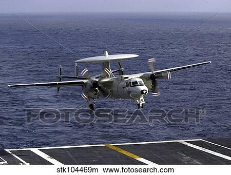 An E-2C Hawkeye approaches the flight deck aboard USS Nimitz. View Large Photo Image Picture - An E-2C Hawkeye approaches the flight deck aboard USS Nimitz.. Fotosearch