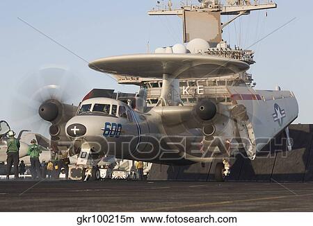 An E-2C Hawkeye during flight operations on USS Dwight D. Eisenhower. View Large Photo Image Picture - An E-2C Hawkeye during flight operations on USS Dwight D. Eisenhower.. Fotosearch
