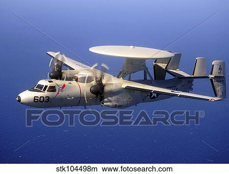 Picture - An E-2C Hawkeye flying over the Pacific Ocean.. Fotosearch