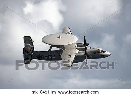 An E-2C Hawkeye in flight over the Pacific Ocean. View Large Photo Image Picture - An E-2C Hawkeye in flight over the Pacific Ocean.. Fotosearch
