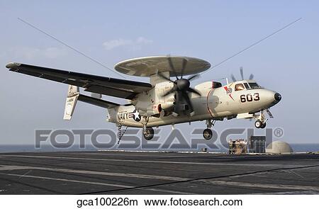 An E-2C Hawkeye landing on the flight deck of USS George H. W. Bush. View Large Photo Image Picture - An E-2C Hawkeye landing on the flight deck of USS George H. W. Bush.. Fotosearch