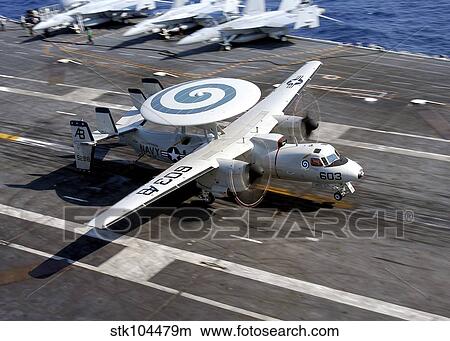 An E-2C Hawkeye lands on the flight deck of USS Enterprise. View Large Photo Image Picture - An E-2C Hawkeye lands on the flight deck of USS Enterprise.. Fotosearch